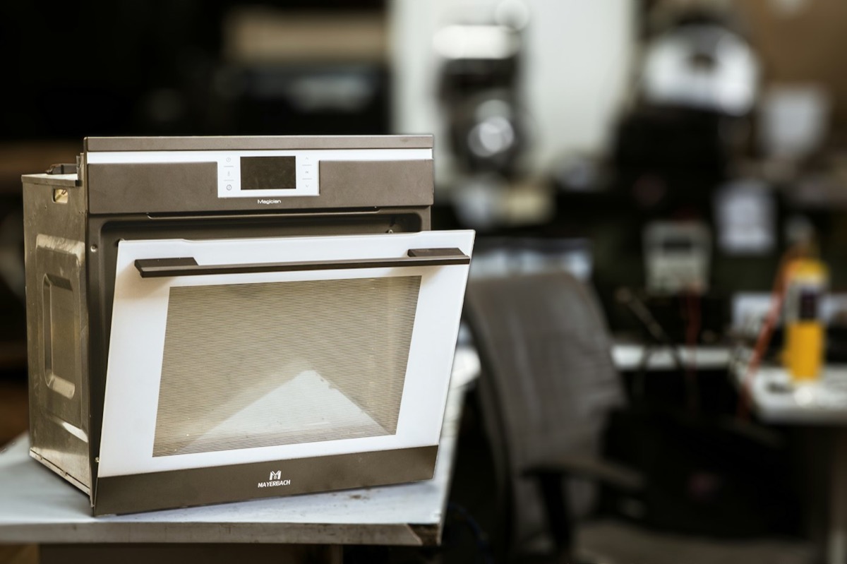 Oven on a repair workbench during diagnosis